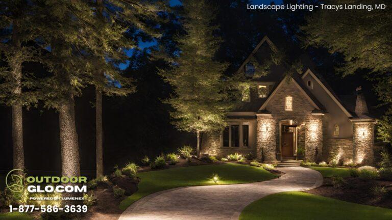 Outside of a suburban home with beautiful landscape lighting outside